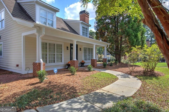 view of front of home featuring covered porch