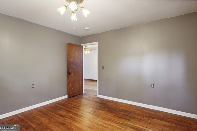 empty room featuring wood-type flooring