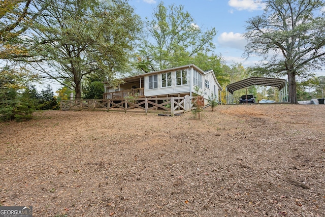 exterior space featuring a carport