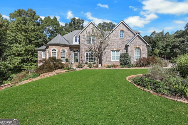 view of front of home with a front yard