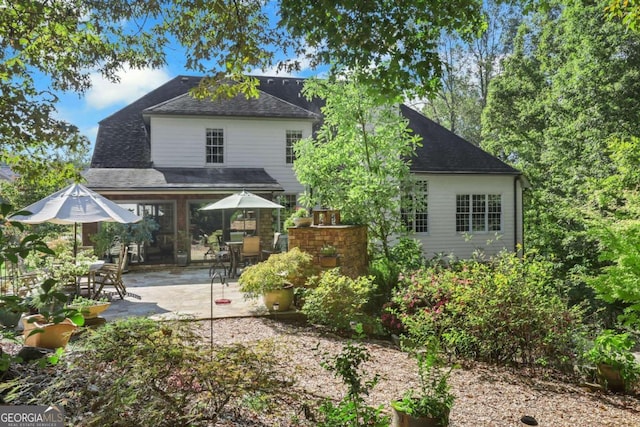 back of house featuring a patio