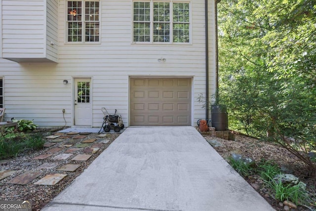 garage featuring wood walls