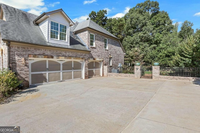 view of property exterior with a garage