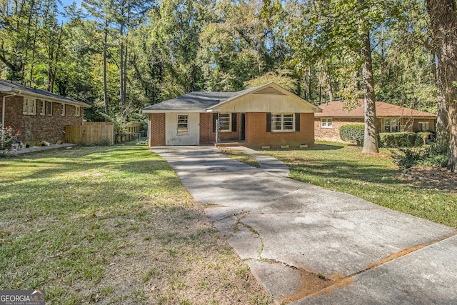 ranch-style house with a front lawn