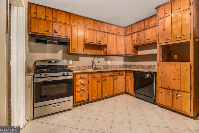 kitchen featuring stainless steel range, black dishwasher, sink, and light tile patterned floors