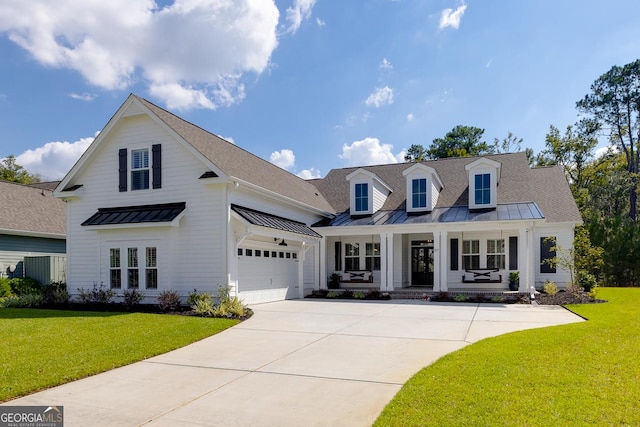 205 Park Chase, Pooler, GA 31322 - modern farmhouse style home featuring a standing seam roof, covered porch, a front lawn, and concrete driveway
