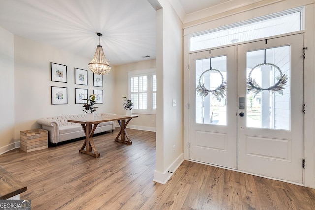 205 Park Chase, Pooler, GA 31322 - foyer entrance with baseboards, light wood finished floors, a chandelier, and french doors