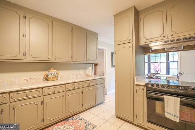 kitchen featuring ornamental molding, black range with electric cooktop, and light tile patterned floors