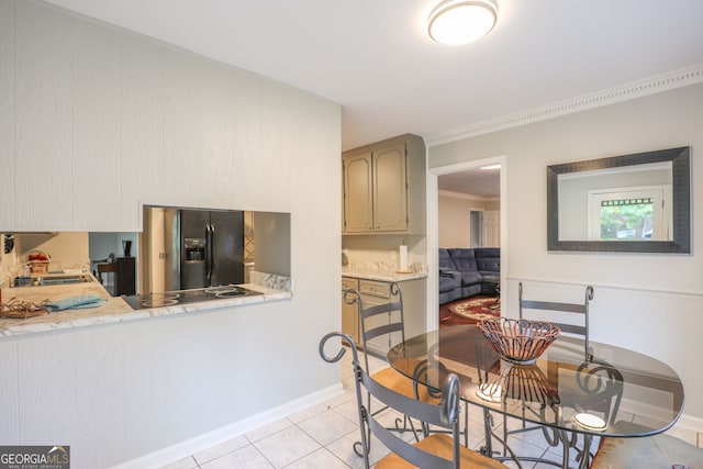 tiled dining space with ornamental molding