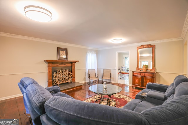 living room with hardwood / wood-style flooring and ornamental molding