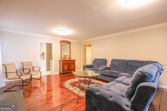 living room with ornamental molding and hardwood / wood-style floors