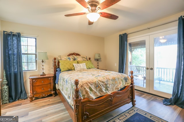 bedroom featuring wood-type flooring, french doors, access to exterior, and ceiling fan