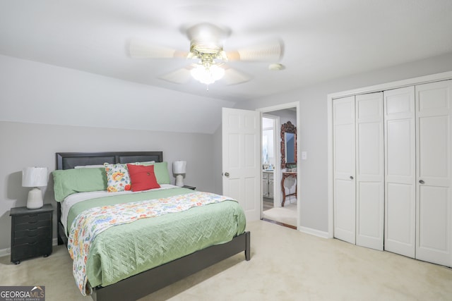 bedroom with light carpet, ceiling fan, and vaulted ceiling