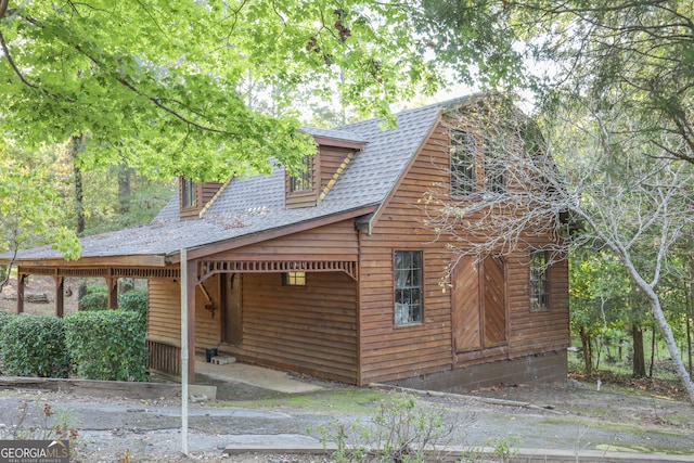 view of log-style house