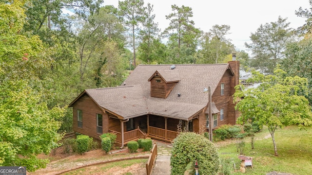 log cabin with covered porch