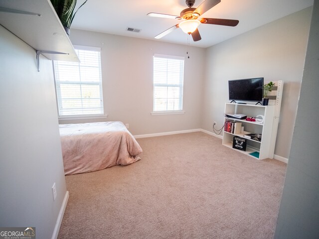 bedroom with carpet flooring and ceiling fan