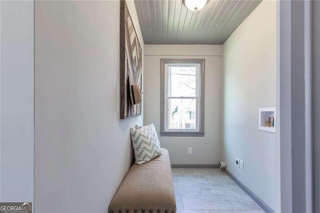 living area featuring wood ceiling