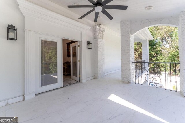 view of patio with ceiling fan