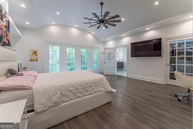 bedroom with dark wood-type flooring, high vaulted ceiling, and connected bathroom