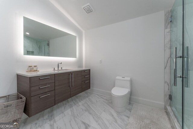 bathroom featuring a shower with door, vanity, and toilet