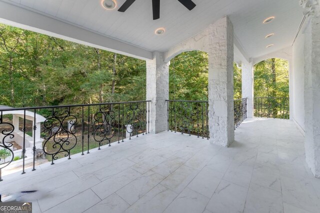 view of patio with a balcony