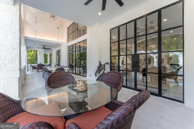 dining space with ceiling fan