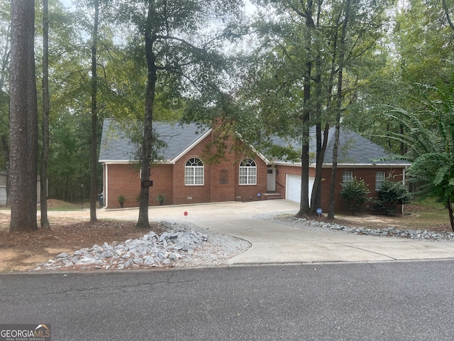 ranch-style home with a garage