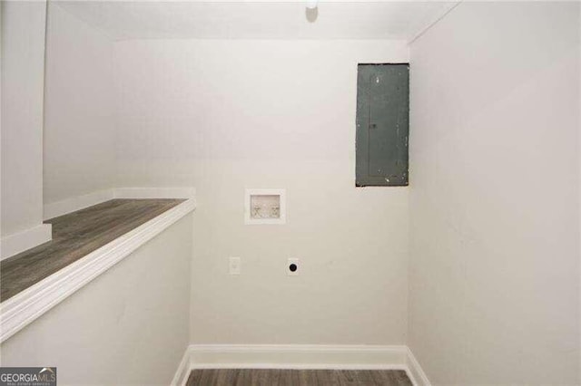 clothes washing area featuring electric panel, hookup for a washing machine, dark hardwood / wood-style floors, and electric dryer hookup