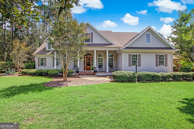 view of front of home featuring a porch and a front lawn