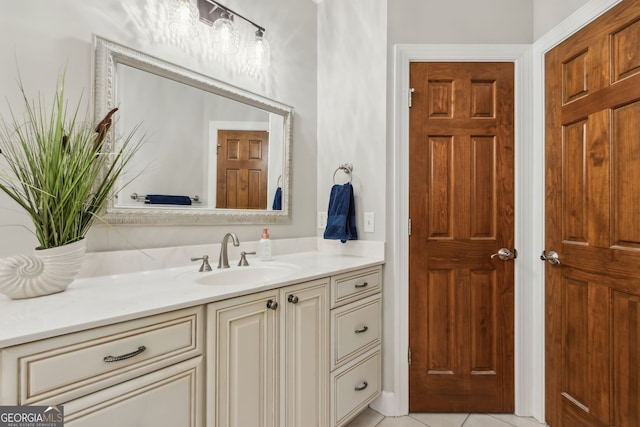 bathroom with vanity and tile patterned flooring