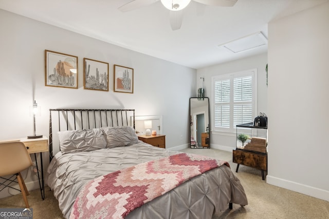 bedroom with ceiling fan and carpet