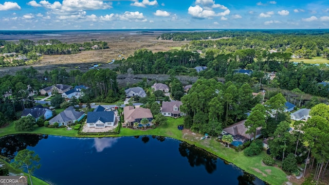 drone / aerial view with a water view