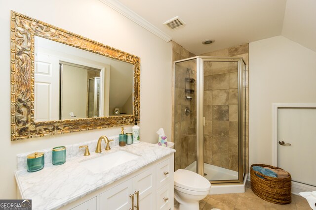 bathroom with tile patterned floors, walk in shower, ornamental molding, vanity, and toilet