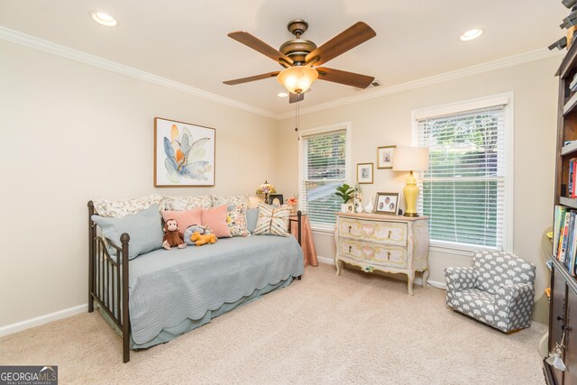 bedroom featuring carpet flooring, ceiling fan, and ornamental molding