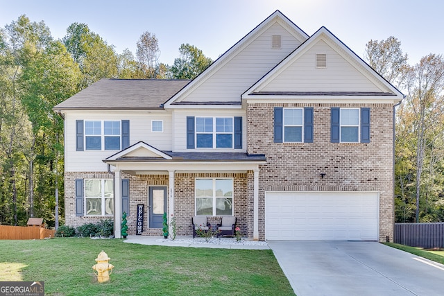 craftsman-style home with fence, driveway, brick siding, and a garage
