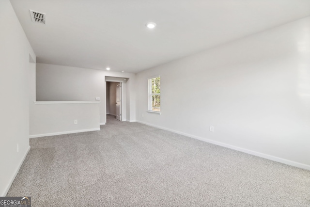 empty room with carpet flooring