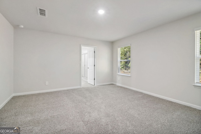 view of carpeted spare room