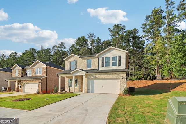 view of front facade featuring a front yard and a garage