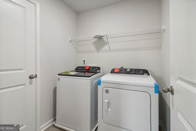 laundry room featuring independent washer and dryer