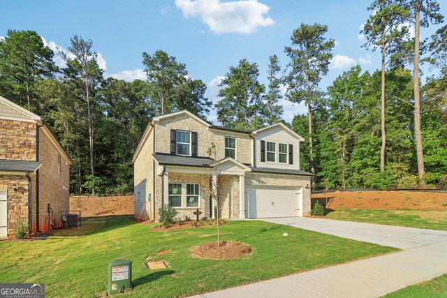 view of front facade featuring a front yard and a garage