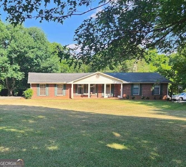 ranch-style house with a front yard