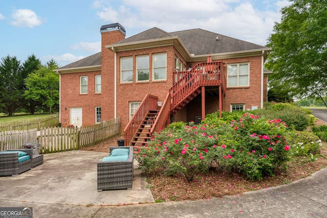 rear view of house featuring a patio area