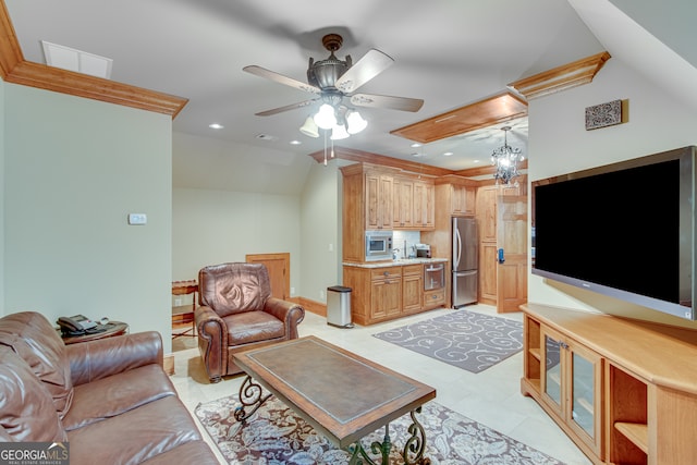 living room with ceiling fan with notable chandelier and light tile patterned floors