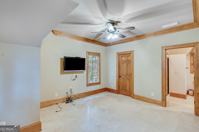 unfurnished living room featuring crown molding and ceiling fan