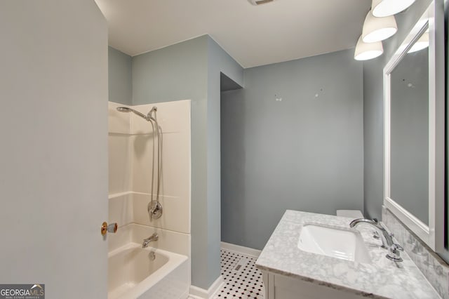 bathroom featuring tub / shower combination and vanity