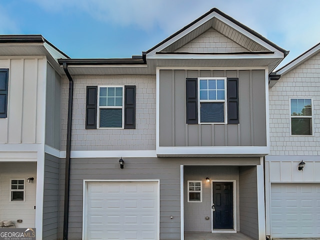 view of property featuring a garage