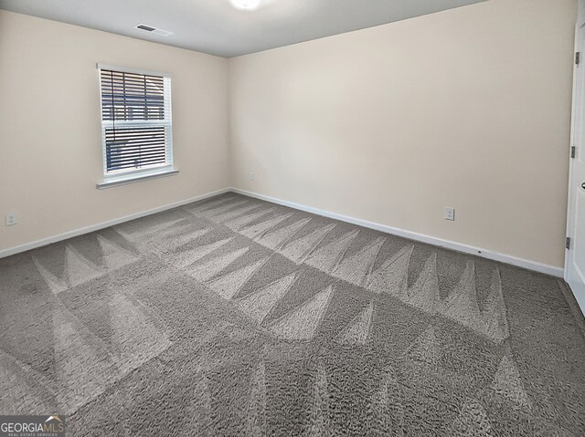 empty room with carpet floors