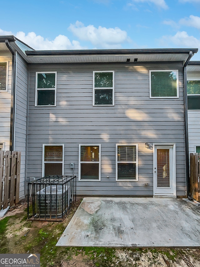 rear view of property with a patio area