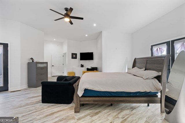 bedroom featuring light wood-type flooring and ceiling fan