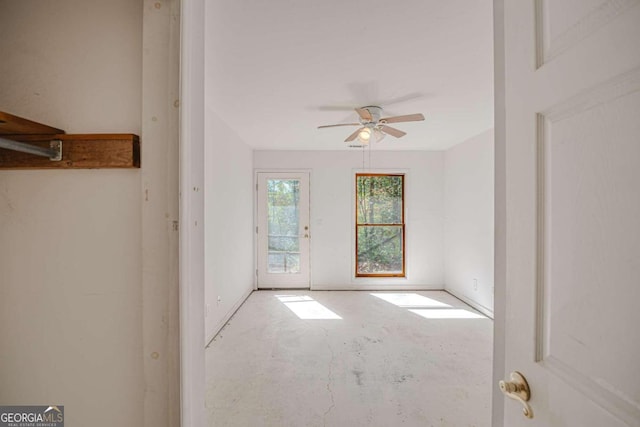 unfurnished room with ceiling fan